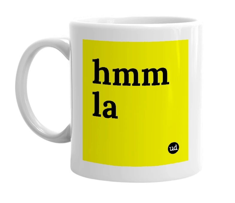 White mug with 'hmm la' in bold black letters