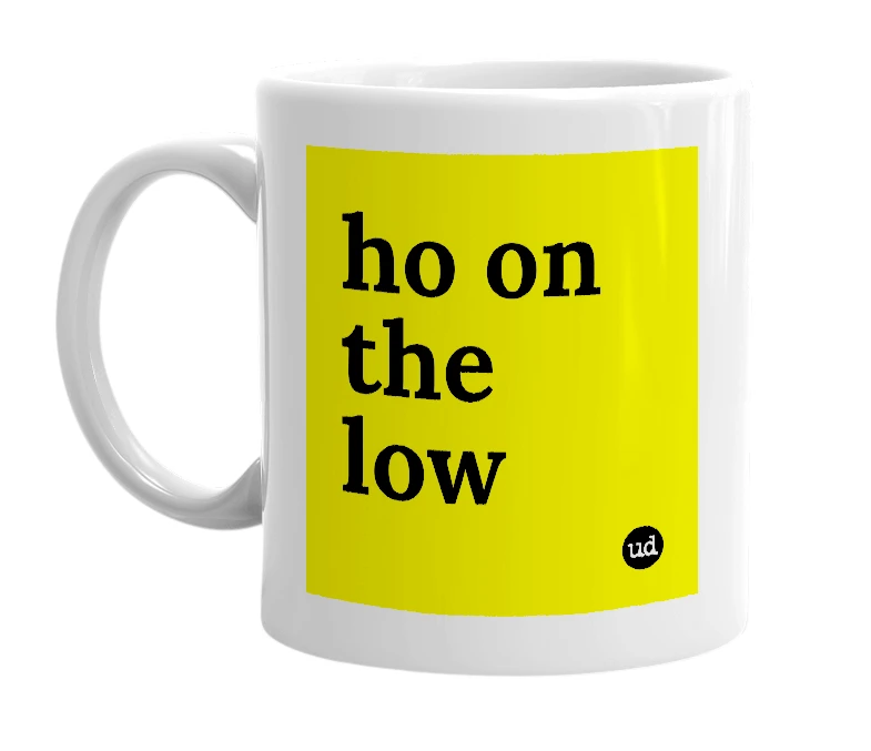 White mug with 'ho on the low' in bold black letters