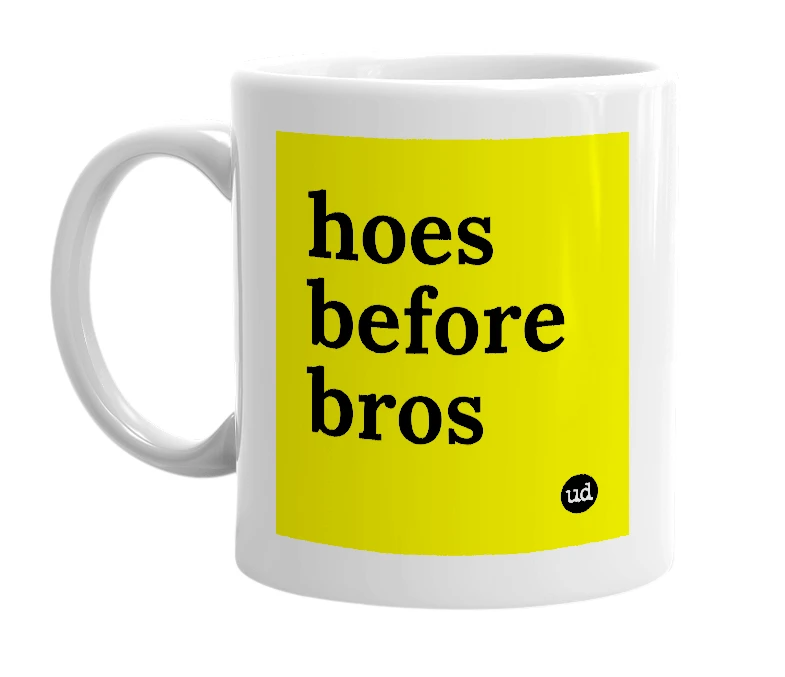 White mug with 'hoes before bros' in bold black letters