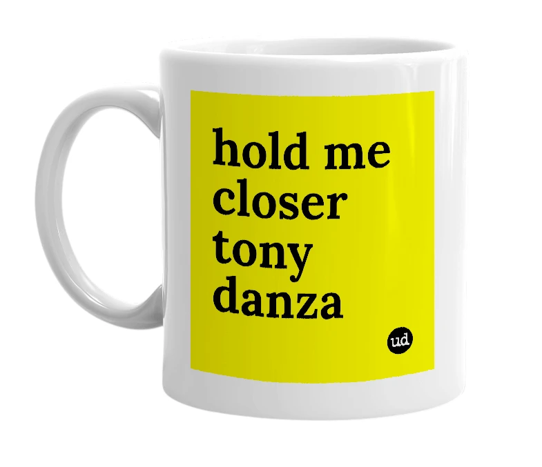 White mug with 'hold me closer tony danza' in bold black letters