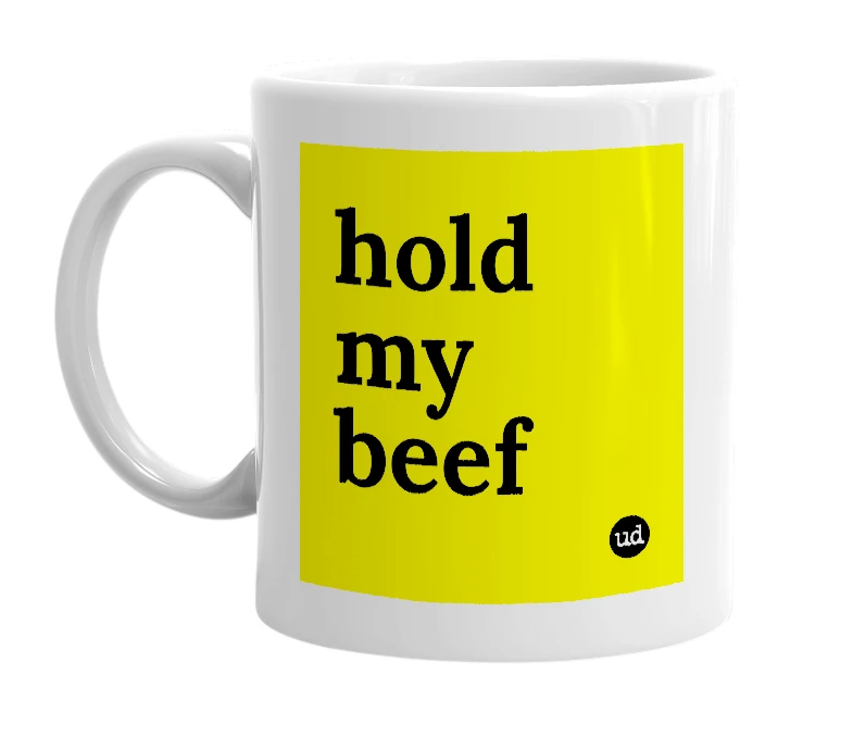 White mug with 'hold my beef' in bold black letters