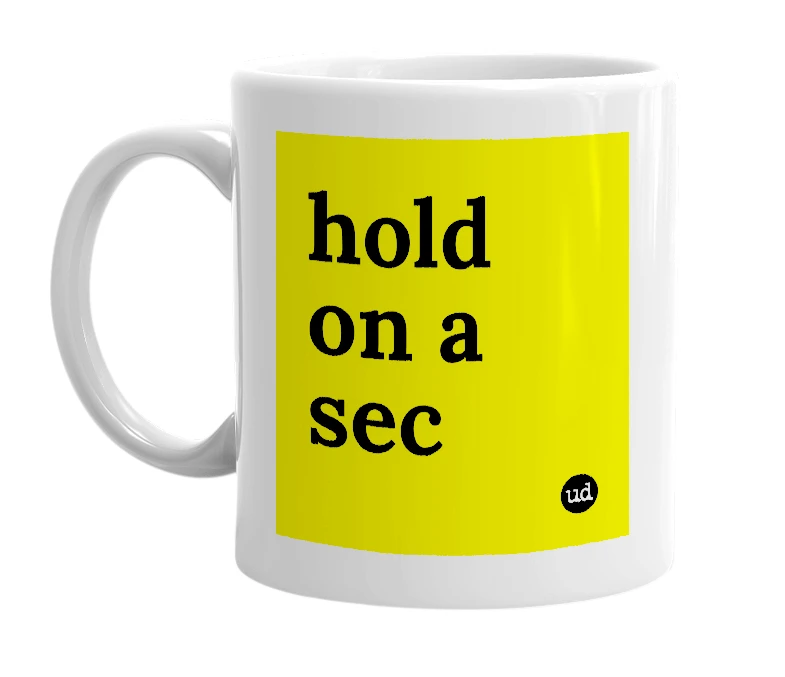 White mug with 'hold on a sec' in bold black letters