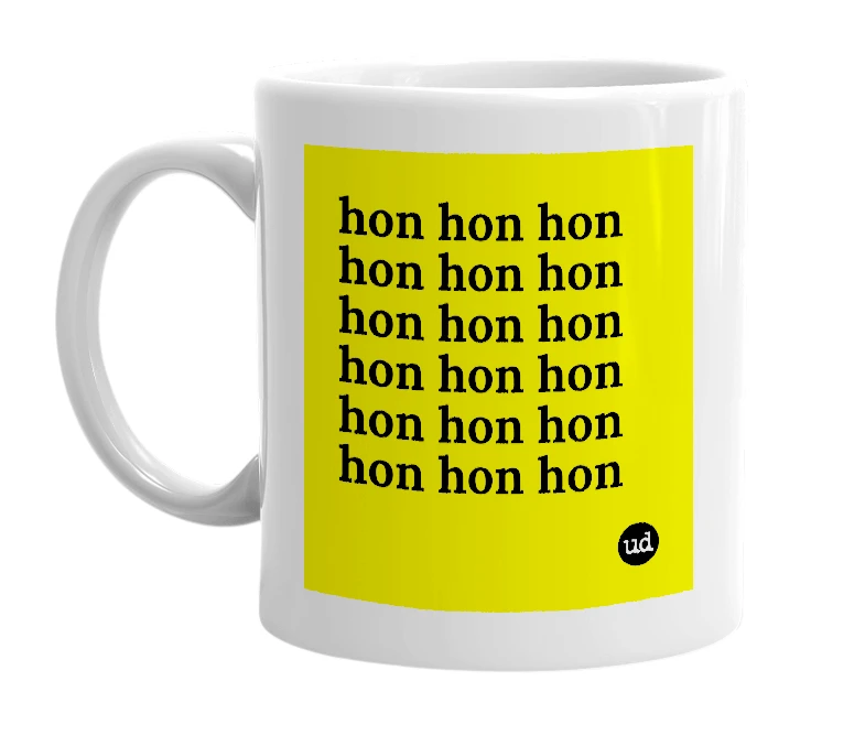 White mug with 'hon hon hon hon hon hon hon hon hon hon hon hon hon hon hon hon hon hon' in bold black letters