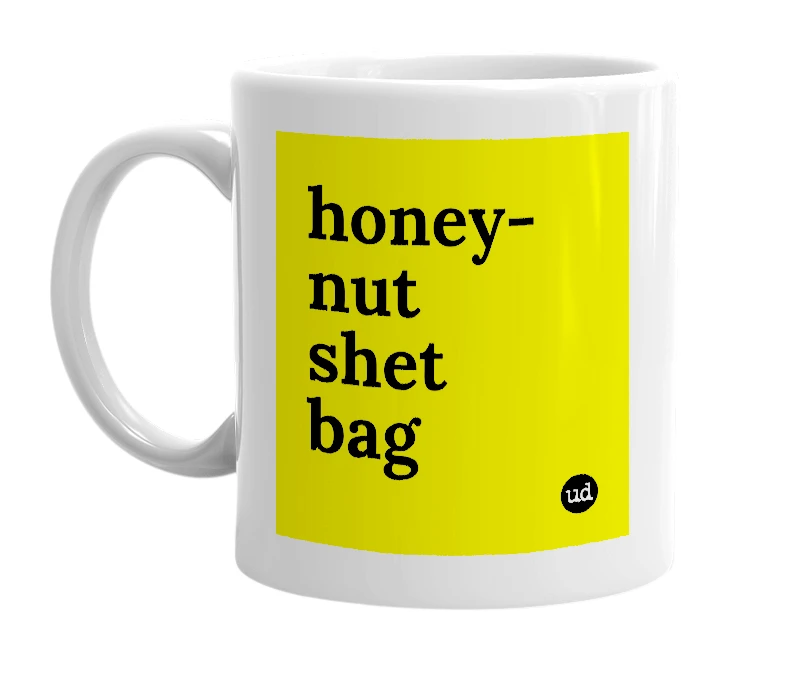 White mug with 'honey-nut shet bag' in bold black letters