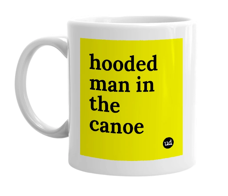 White mug with 'hooded man in the canoe' in bold black letters
