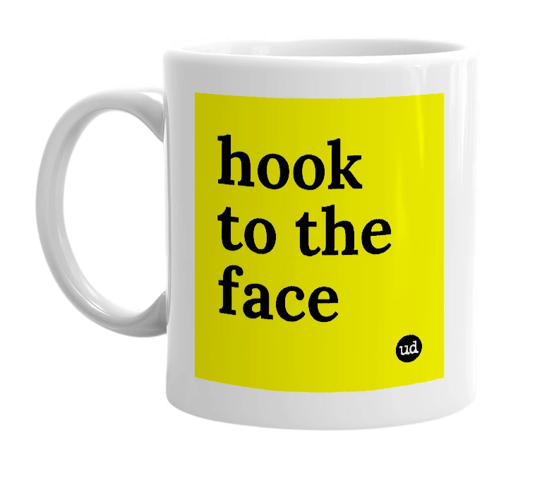 White mug with 'hook to the face' in bold black letters