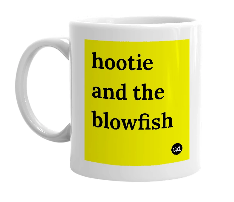 White mug with 'hootie and the blowfish' in bold black letters