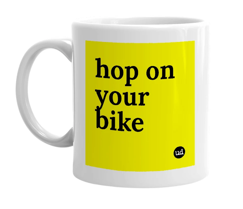 White mug with 'hop on your bike' in bold black letters