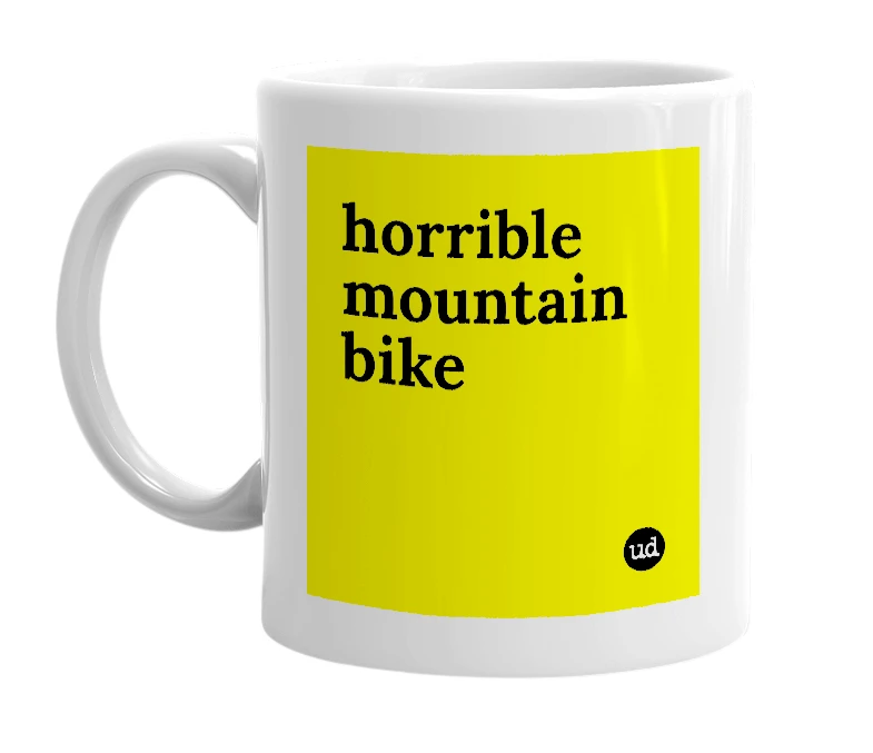 White mug with 'horrible mountain bike' in bold black letters