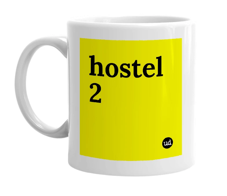 White mug with 'hostel 2' in bold black letters