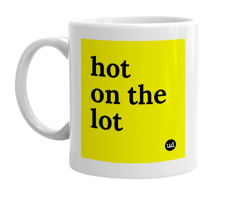 White mug with 'hot on the lot' in bold black letters
