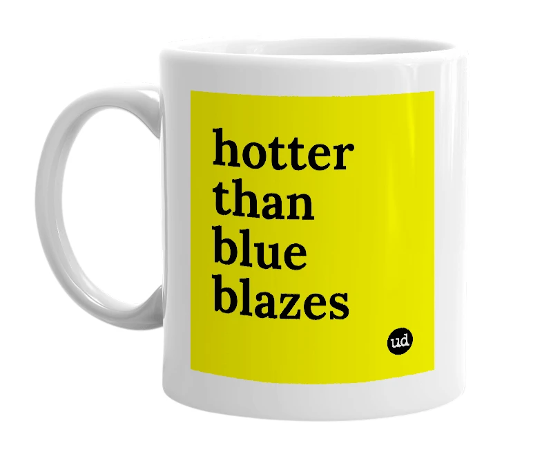 White mug with 'hotter than blue blazes' in bold black letters