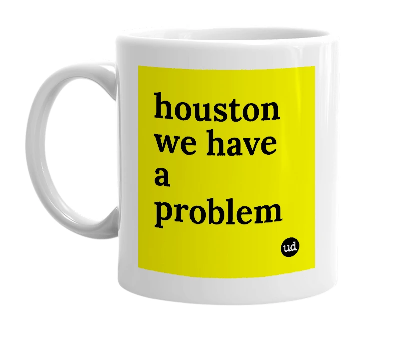 White mug with 'houston we have a problem' in bold black letters