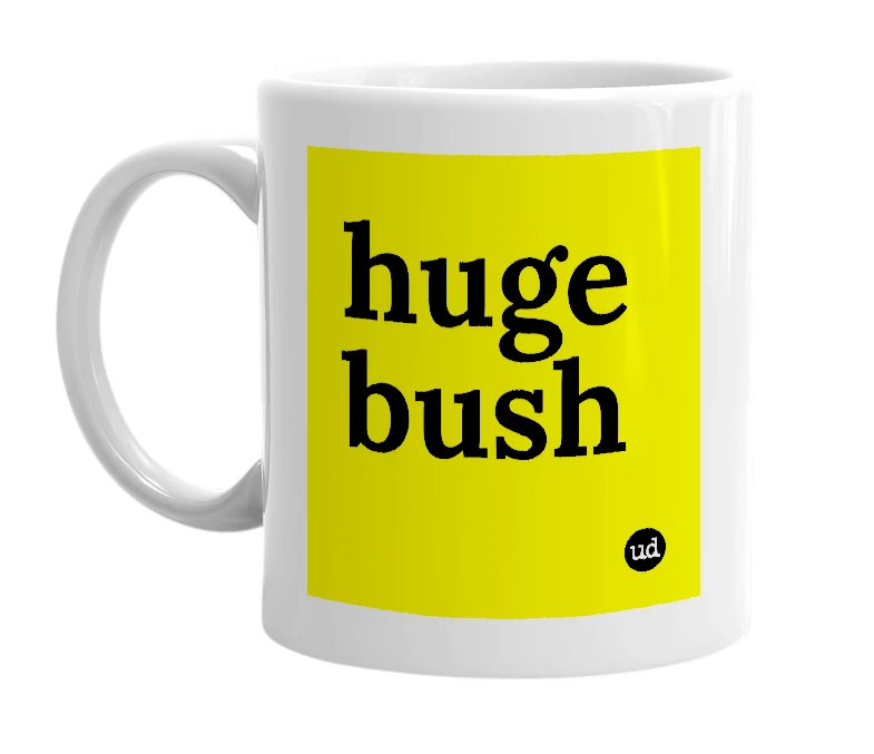 White mug with 'huge bush' in bold black letters