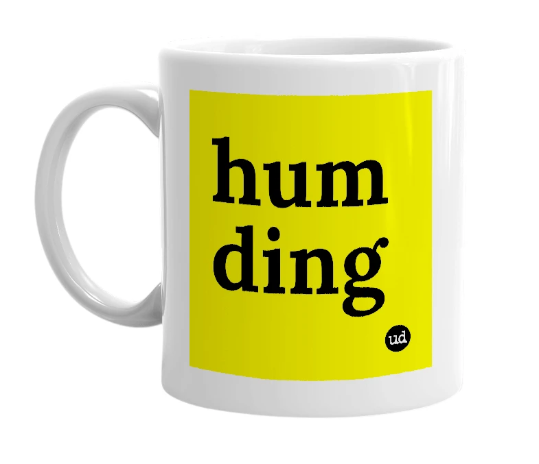 White mug with 'hum ding' in bold black letters