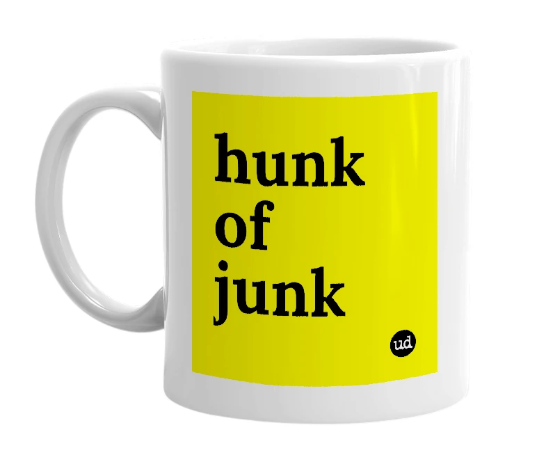 White mug with 'hunk of junk' in bold black letters