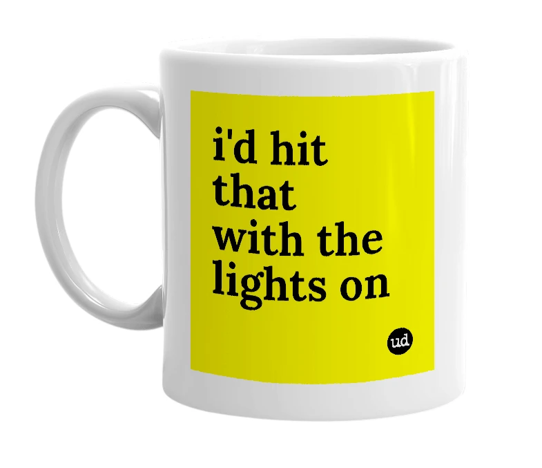 White mug with 'i'd hit that with the lights on' in bold black letters