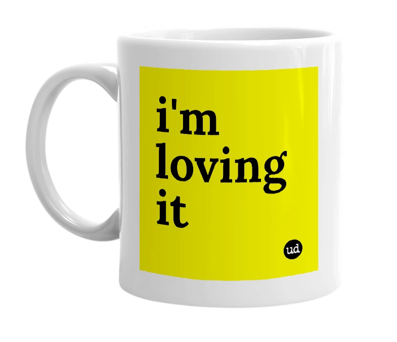 White mug with 'i'm loving it' in bold black letters