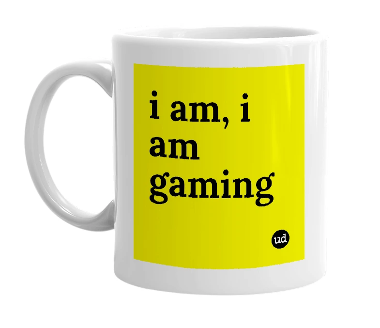 White mug with 'i am, i am gaming' in bold black letters