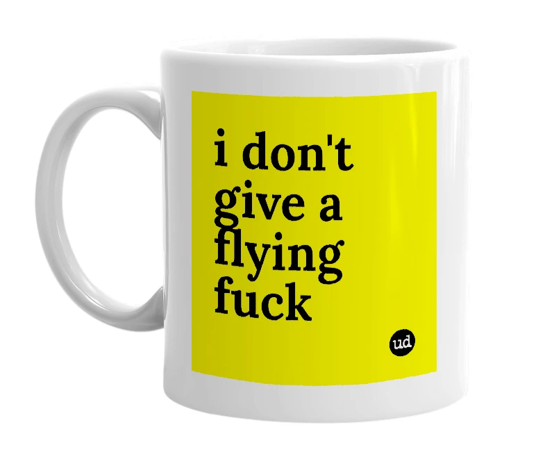 White mug with 'i don't give a flying fuck' in bold black letters