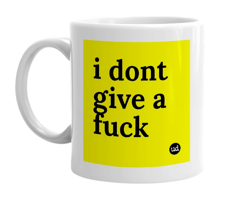 White mug with 'i dont give a fuck' in bold black letters