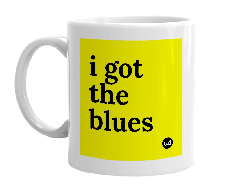 White mug with 'i got the blues' in bold black letters