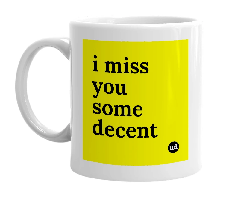 White mug with 'i miss you some decent' in bold black letters