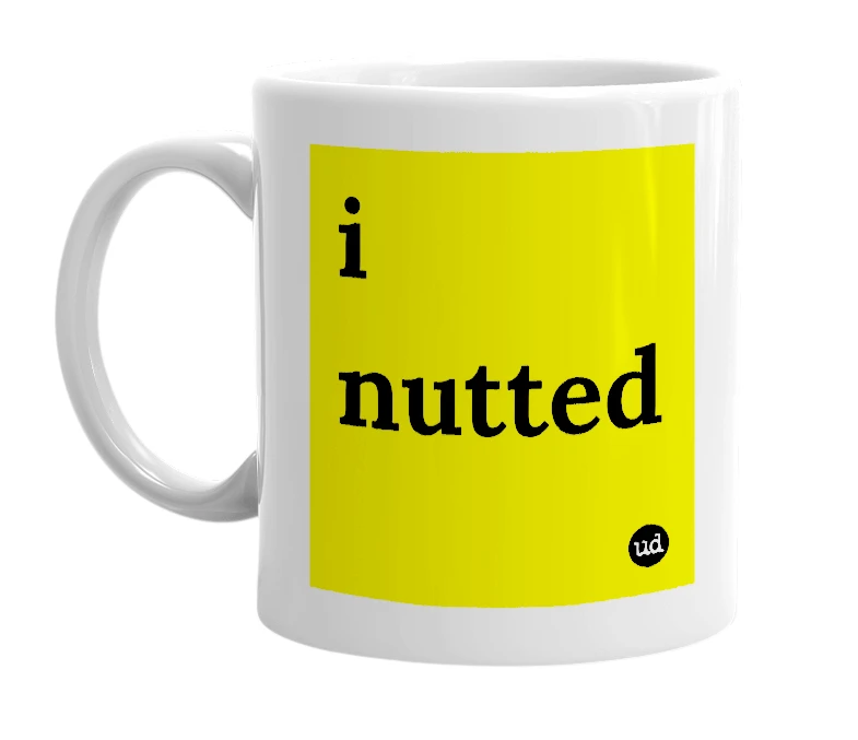 White mug with 'i nutted' in bold black letters