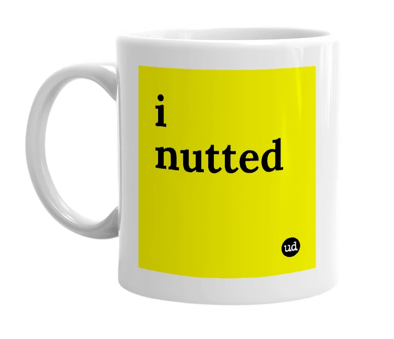 White mug with 'i nutted' in bold black letters