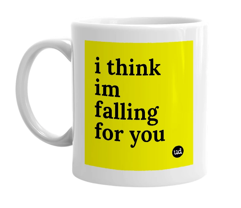 White mug with 'i think im falling for you' in bold black letters