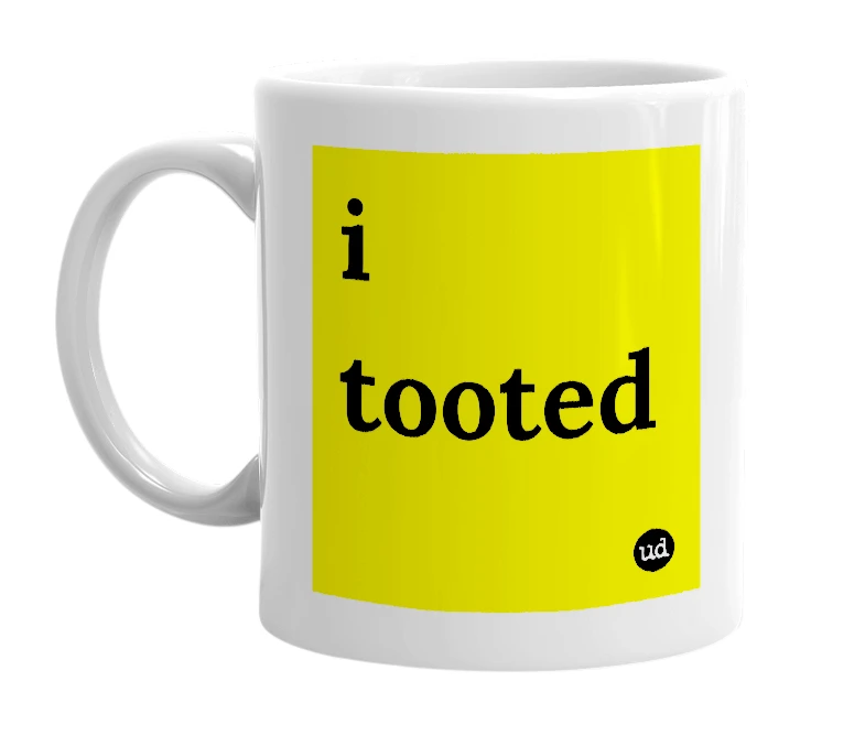 White mug with 'i tooted' in bold black letters