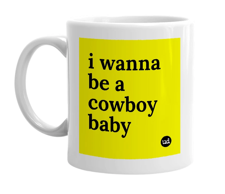 White mug with 'i wanna be a cowboy baby' in bold black letters