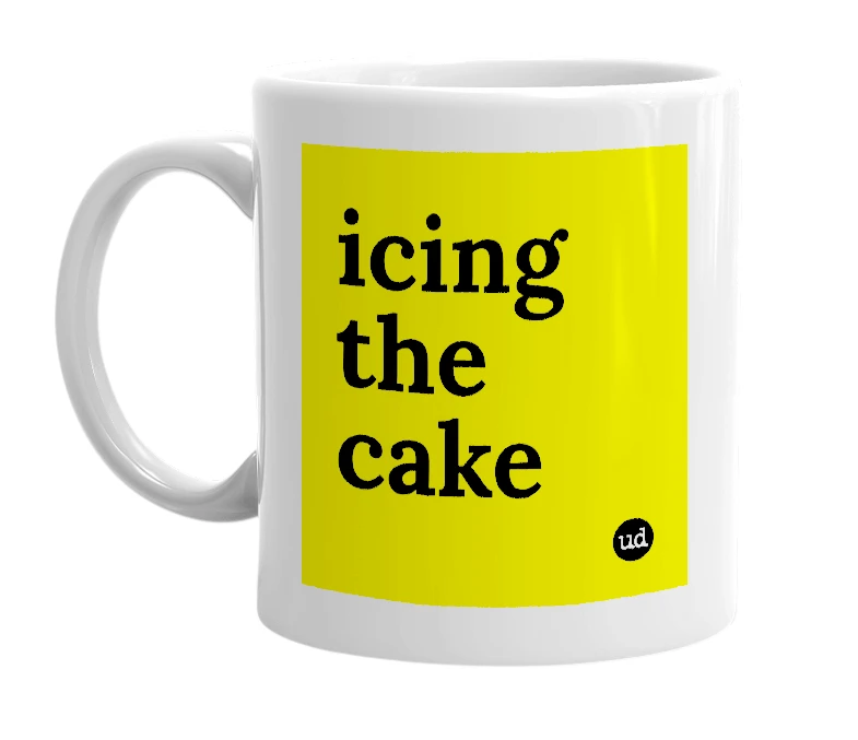 White mug with 'icing the cake' in bold black letters