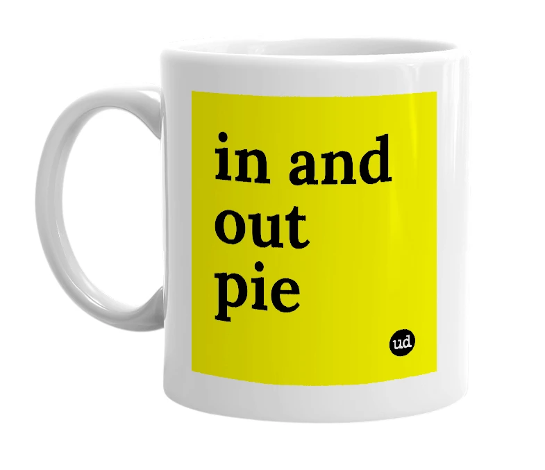 White mug with 'in and out pie' in bold black letters
