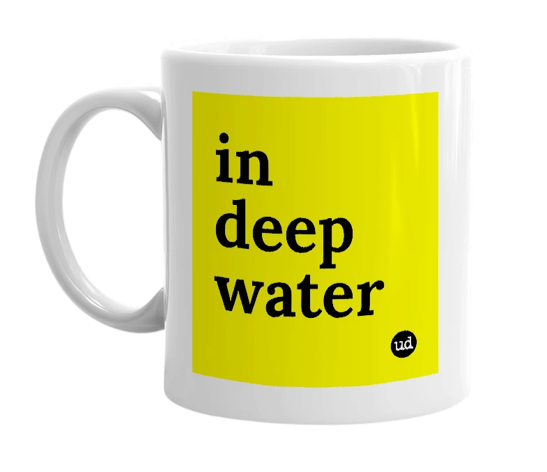 White mug with 'in deep water' in bold black letters