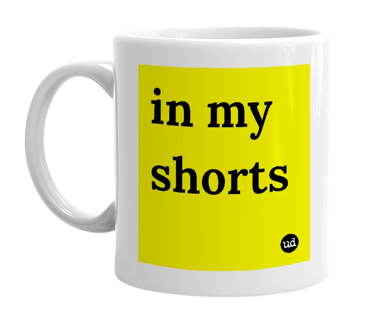 White mug with 'in my shorts' in bold black letters