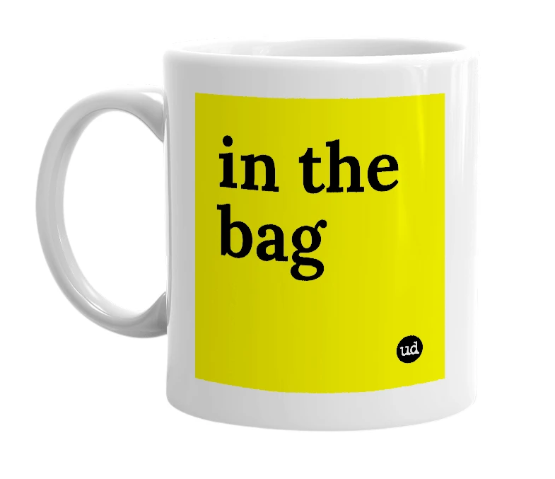 White mug with 'in the bag' in bold black letters