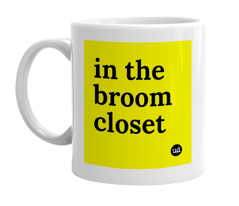 White mug with 'in the broom closet' in bold black letters