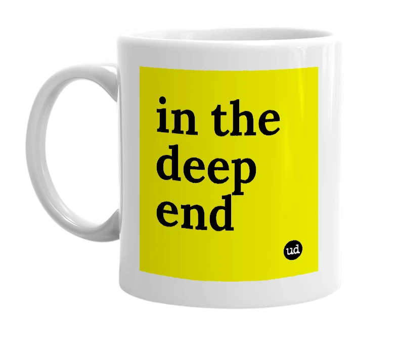 White mug with 'in the deep end' in bold black letters