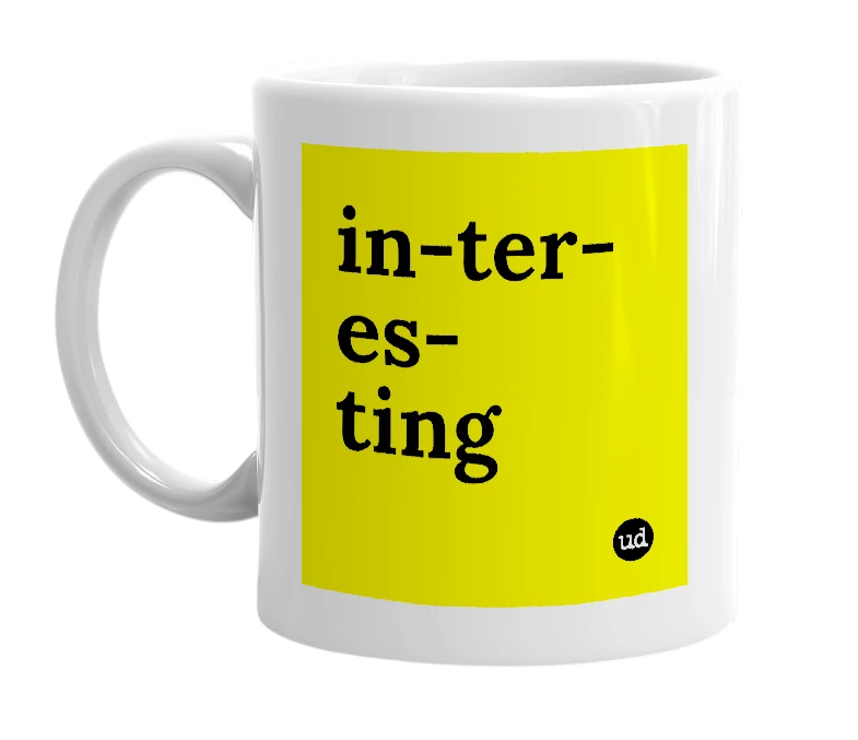 White mug with 'in-ter-es-ting' in bold black letters