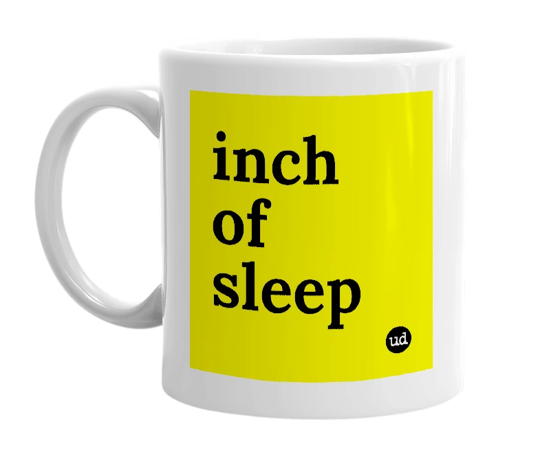 White mug with 'inch of sleep' in bold black letters