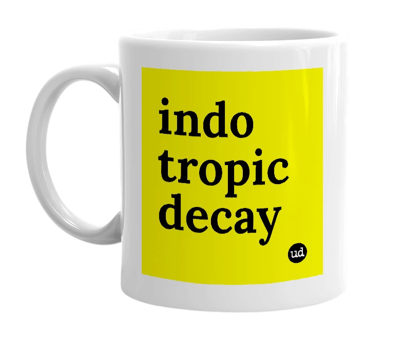 White mug with 'indo tropic decay' in bold black letters