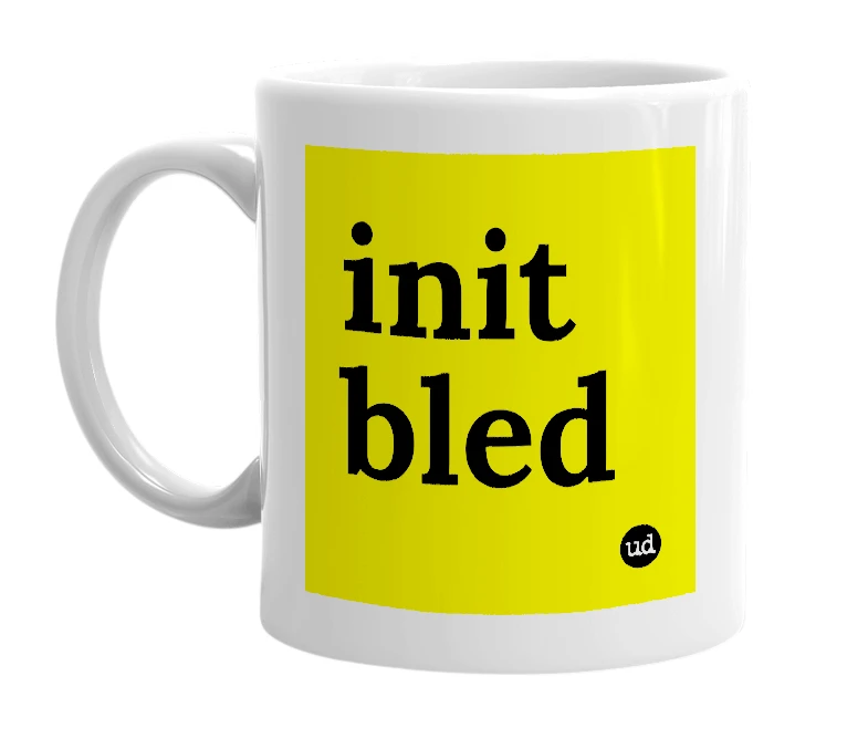 White mug with 'init bled' in bold black letters