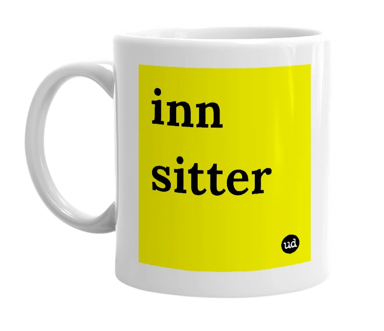 White mug with 'inn sitter' in bold black letters