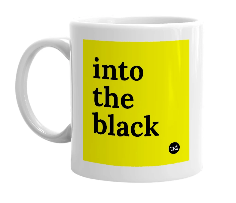 White mug with 'into the black' in bold black letters