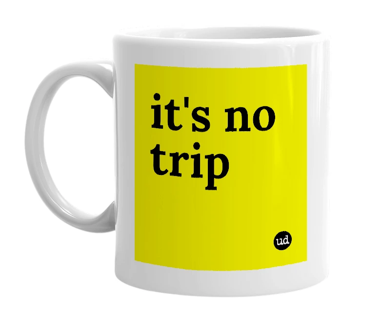 White mug with 'it's no trip' in bold black letters