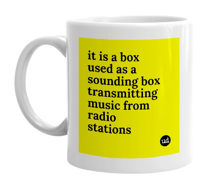 White mug with 'it is a box used as a sounding box transmitting music from radio stations' in bold black letters