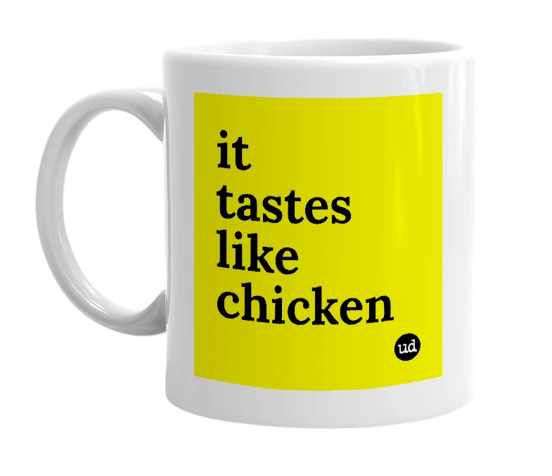 White mug with 'it tastes like chicken' in bold black letters