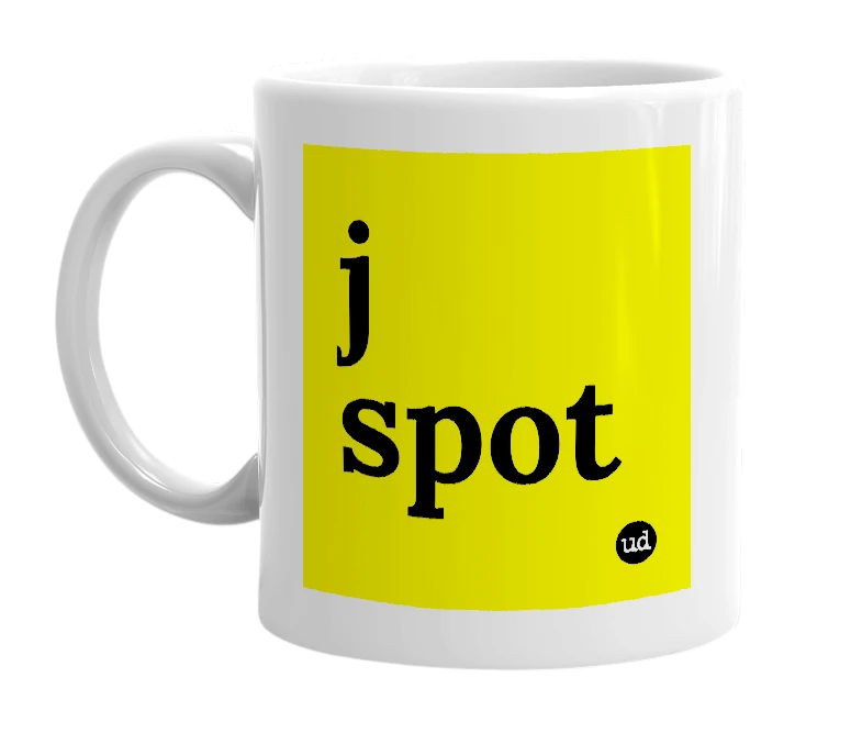 White mug with 'j spot' in bold black letters