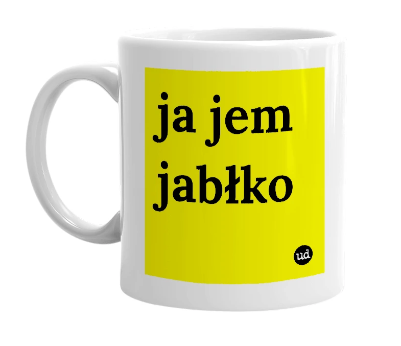 White mug with 'ja jem jabłko' in bold black letters